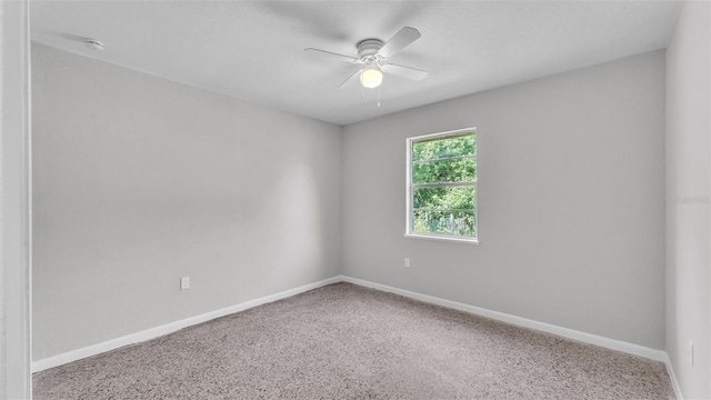 1017 Fleming Ave, Lakeland, FL 33815 - spare room featuring a ceiling fan, baseboards, and carpet flooring