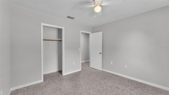 1017 Fleming Ave, Lakeland, FL 33815 - unfurnished bedroom featuring baseboards, a closet, carpet flooring, and ceiling fan