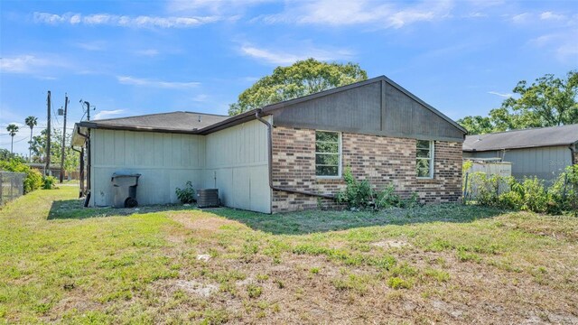 1017 Fleming Ave, Lakeland, FL 33815 - rear view of house featuring brick siding