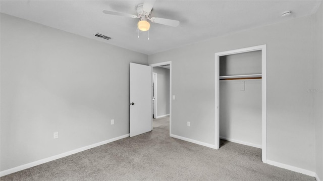 1017 Fleming Ave, Lakeland, FL 33815 - unfurnished bedroom featuring carpet, baseboards, a closet, and ceiling fan