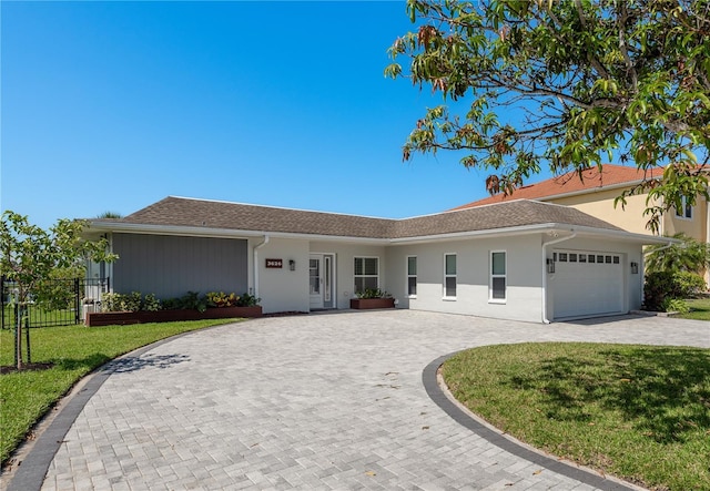 3626 Corsair Ct, New Port Richey, FL 34652 - single story home with curved driveway, stucco siding, and an attached garage