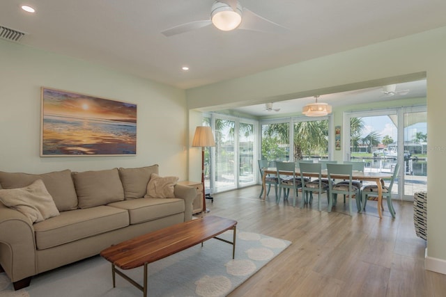 3626 Corsair Ct, New Port Richey, FL 34652 - living area with ceiling fan, light wood-style flooring, and recessed lighting