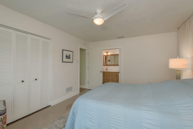 3626 Corsair Ct, New Port Richey, FL 34652 - bedroom with a closet, a ceiling fan, baseboards, and connected bathroom