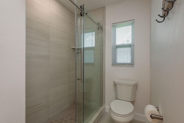 3626 Corsair Ct, New Port Richey, FL 34652 - bathroom featuring a stall shower and toilet