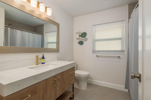 3626 Corsair Ct, New Port Richey, FL 34652 - full bath featuring vanity, baseboards, toilet, and tile patterned flooring