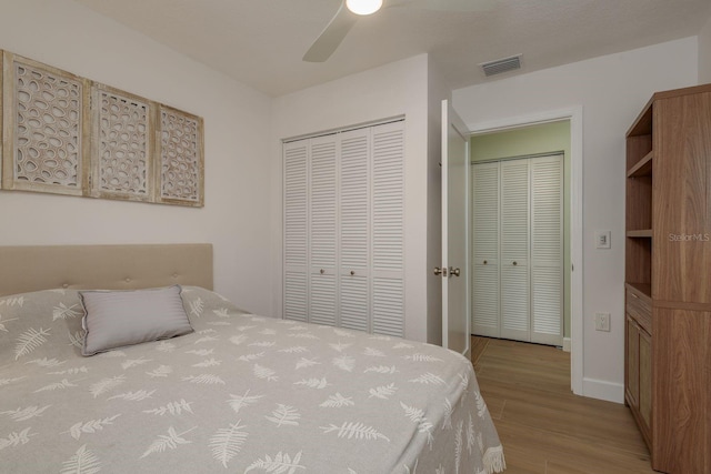 3626 Corsair Ct, New Port Richey, FL 34652 - bedroom featuring wood finished floors, a closet, baseboards, and a ceiling fan