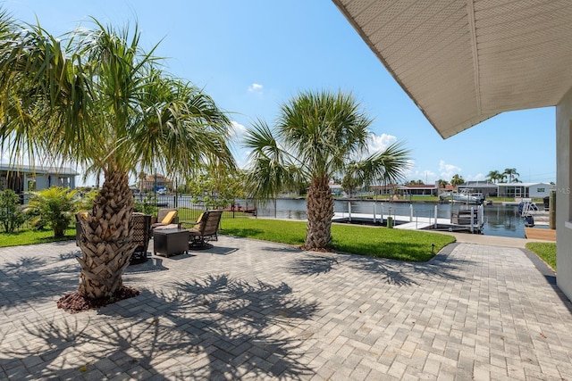 3626 Corsair Ct, New Port Richey, FL 34652 - view of patio / terrace featuring a water view and a dock