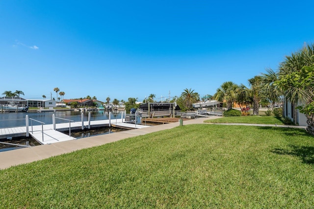 3626 Corsair Ct, New Port Richey, FL 34652 - dock area featuring a yard and a water view