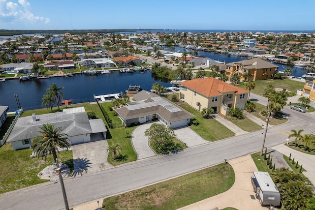3626 Corsair Ct, New Port Richey, FL 34652 - aerial perspective of suburban area featuring a large body of water