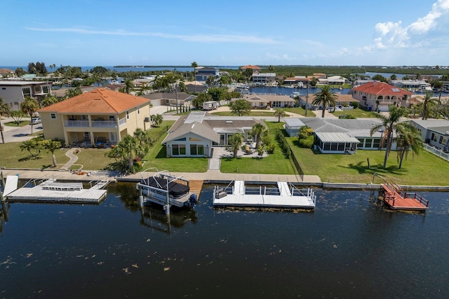 3626 Corsair Ct, New Port Richey, FL 34652 - aerial perspective of suburban area with a large body of water