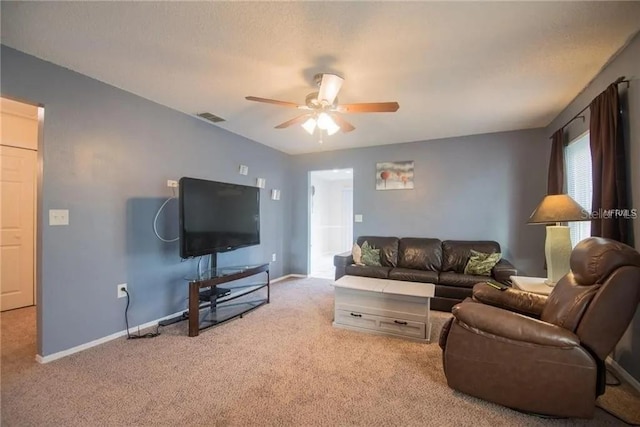 1410 Bramblewood Dr, Lakeland, FL 33811 - living area with light carpet, a ceiling fan, and baseboards
