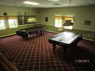 3487 Highland Fairways Blvd, Lakeland, FL 33810 - game room featuring pool table, a drop ceiling, baseboards, carpet floors, and healthy amount of natural light
