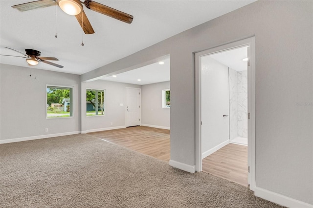 3601 Ave R NW, Winter Haven, FL 33881 - unfurnished room with light carpet, ceiling fan, healthy amount of natural light, and recessed lighting