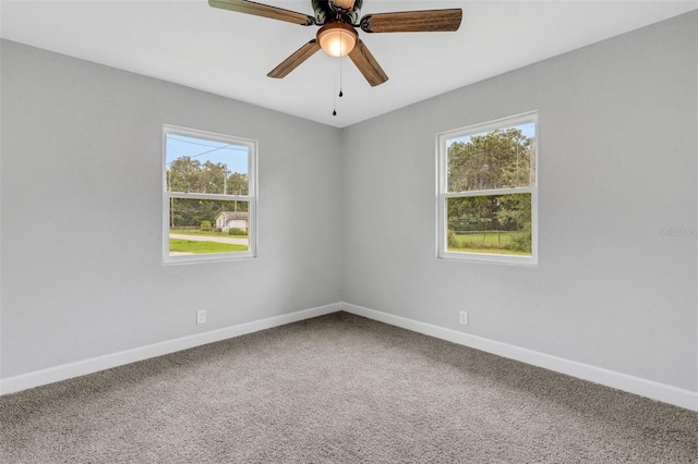 3601 Ave R NW, Winter Haven, FL 33881 - carpeted empty room with baseboards and ceiling fan