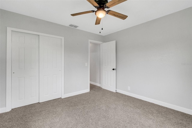 3601 Ave R NW, Winter Haven, FL 33881 - unfurnished bedroom with carpet, baseboards, and a closet