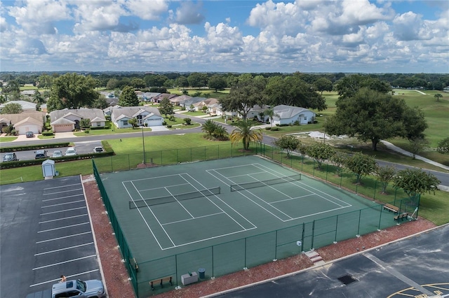 5927 Cormorant Ct, Lakeland, FL 33809 - view of tennis court featuring a residential view