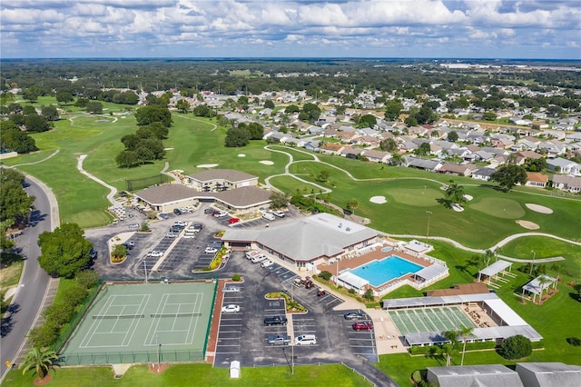 5927 Cormorant Ct, Lakeland, FL 33809 - aerial view of property's location featuring a pool, a local golf course, and nearby suburban area
