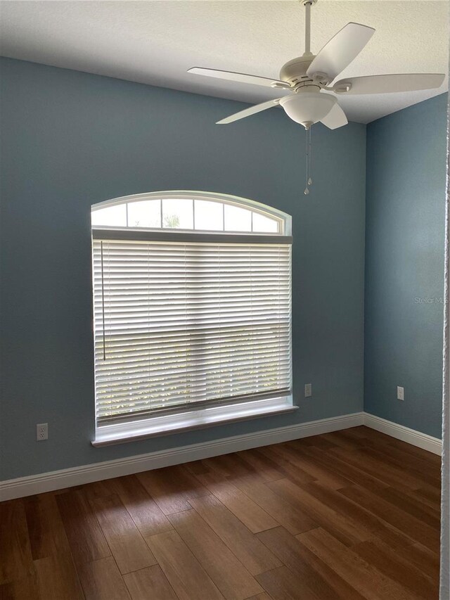 1167 Motorcoach Dr, Polk City, FL 33868 - spare room with ceiling fan, baseboards, and wood finished floors