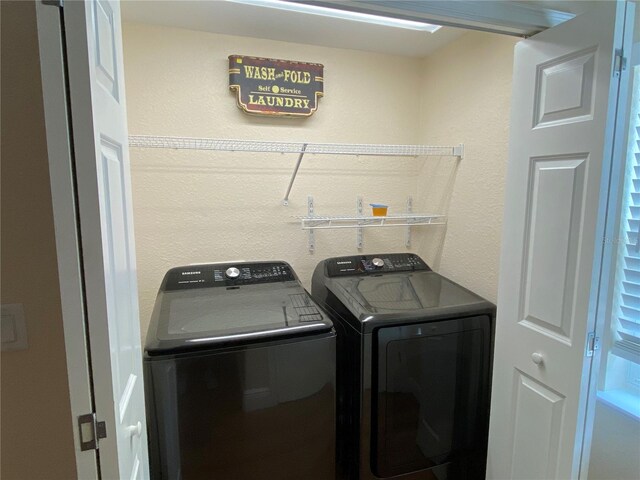 1167 Motorcoach Dr, Polk City, FL 33868 - laundry room with independent washer and dryer