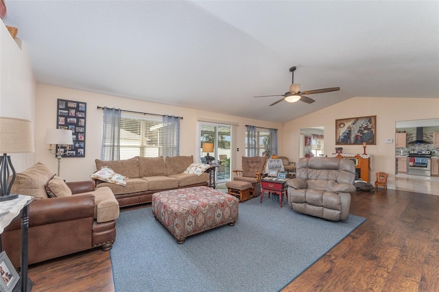 6789 Ashbury Dr, Lakeland, FL 33809 - living area featuring wood finished floors, vaulted ceiling, and ceiling fan