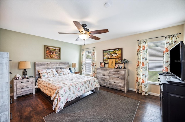 6789 Ashbury Dr, Lakeland, FL 33809 - bedroom featuring hardwood / wood-style floors, baseboards, and a ceiling fan