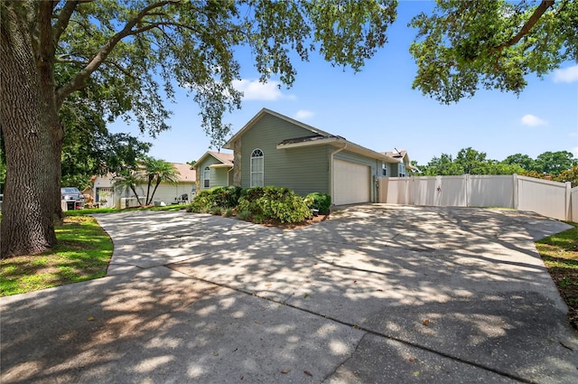 1922 Matthew Ct, Lakeland, FL 33813 - view of home's exterior with a garage and driveway