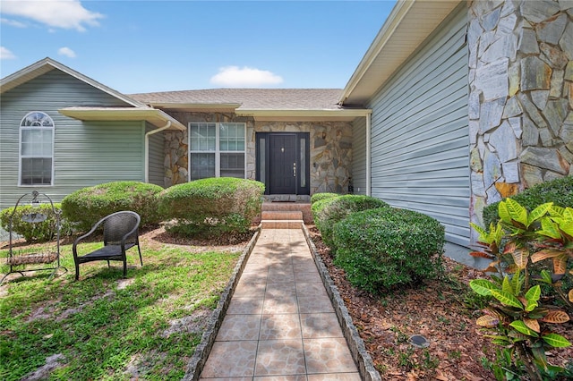 1922 Matthew Ct, Lakeland, FL 33813 - doorway to property featuring stone siding