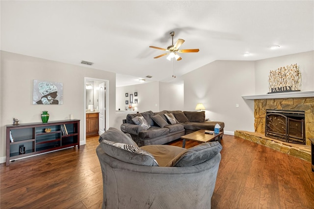 1922 Matthew Ct, Lakeland, FL 33813 - living area with a ceiling fan, wood finished floors, lofted ceiling, and a stone fireplace