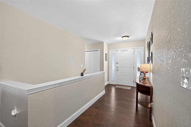 1922 Matthew Ct, Lakeland, FL 33813 - hall with dark wood-style flooring and a textured wall
