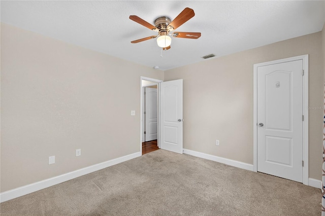 1922 Matthew Ct, Lakeland, FL 33813 - unfurnished bedroom with carpet and a ceiling fan