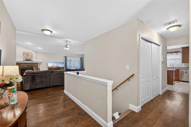 1922 Matthew Ct, Lakeland, FL 33813 - hall with wood finished floors and an upstairs landing