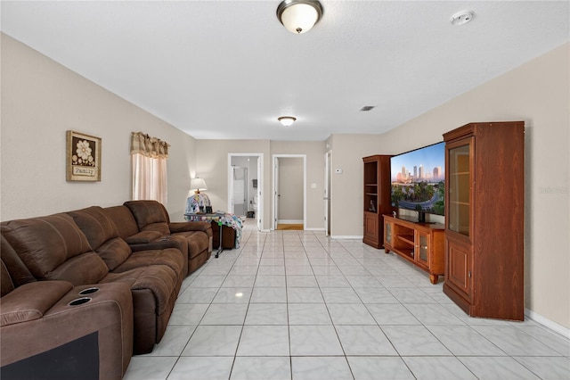 1922 Matthew Ct, Lakeland, FL 33813 - living room with baseboards and light tile patterned flooring