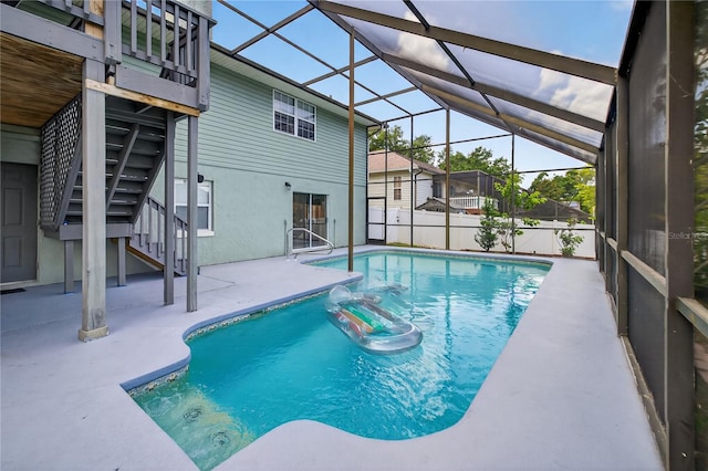 1922 Matthew Ct, Lakeland, FL 33813 - view of pool featuring stairs, a patio area, and glass enclosure