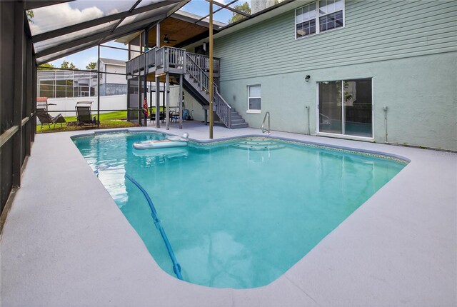 1922 Matthew Ct, Lakeland, FL 33813 - view of pool featuring stairway, a patio area, and a lanai