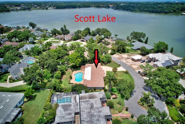 1235 Lake Point Dr, Lakeland, FL 33813 - aerial overview of property's location with a pool, a nearby body of water, and nearby suburban area