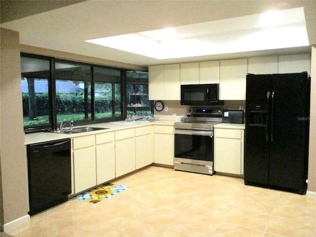 5070 Ironwood Trl, Bartow, FL 33830 - kitchen featuring black appliances, a sink, and light countertops