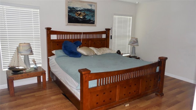 550 Patton Loop, Bartow, FL 33830 - bedroom featuring wood finished floors and baseboards