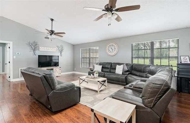 2331 D R Bryant Rd, Lakeland, FL 33810 - living room featuring ceiling fan, plenty of natural light, lofted ceiling, wood finished floors, and a textured ceiling