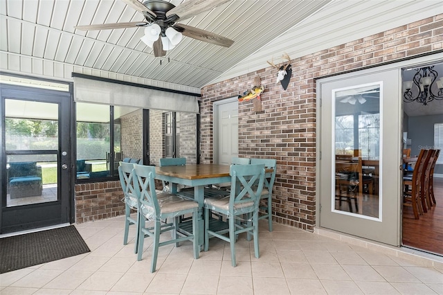 2331 D R Bryant Rd, Lakeland, FL 33810 - sunroom featuring a ceiling fan, outdoor dining space, and vaulted ceiling