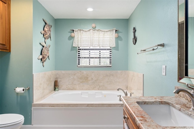 2331 D R Bryant Rd, Lakeland, FL 33810 - full bath featuring toilet, vanity, and a garden tub
