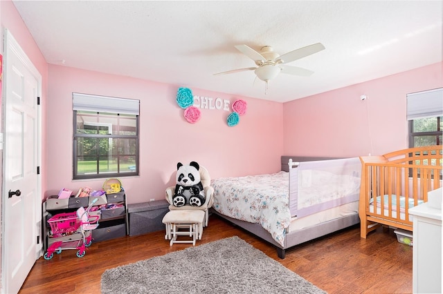 2331 D R Bryant Rd, Lakeland, FL 33810 - bedroom with wood finished floors and ceiling fan