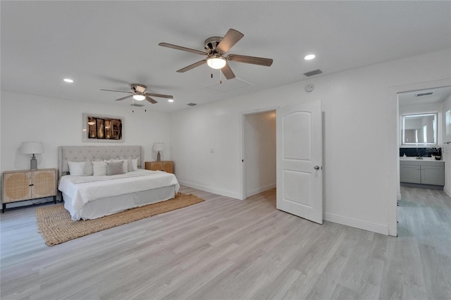 113 Patrick Henry Rd, Bartow, FL 33830 - bedroom featuring light wood-style flooring, recessed lighting, a ceiling fan, ensuite bathroom, and attic access