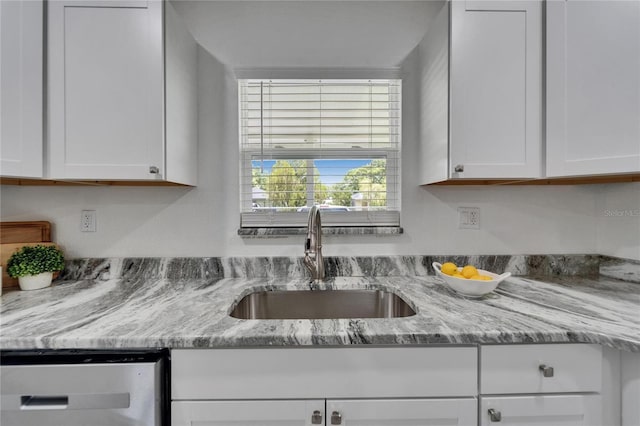 113 Patrick Henry Rd, Bartow, FL 33830 - kitchen featuring white cabinetry, dishwasher, and light stone counters