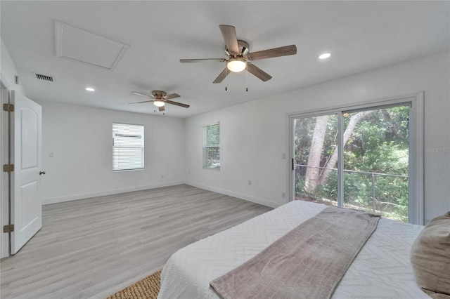 113 Patrick Henry Rd, Bartow, FL 33830 - bedroom with access to outside, light wood finished floors, recessed lighting, a ceiling fan, and attic access