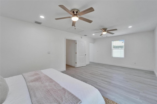 113 Patrick Henry Rd, Bartow, FL 33830 - bedroom featuring attic access, recessed lighting, light wood finished floors, and ceiling fan