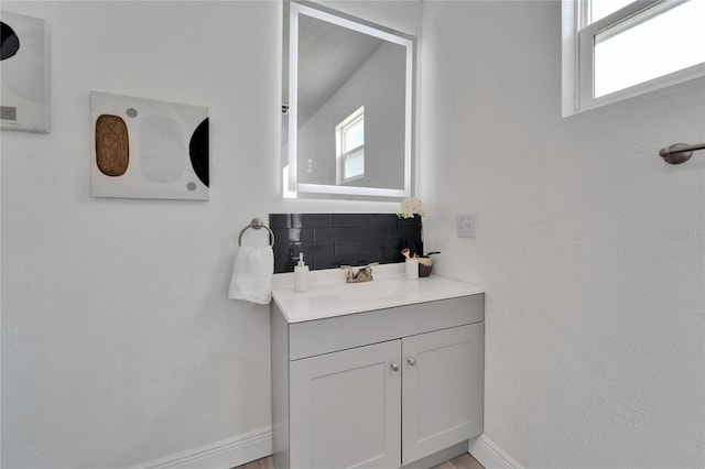 113 Patrick Henry Rd, Bartow, FL 33830 - bathroom featuring vanity and backsplash