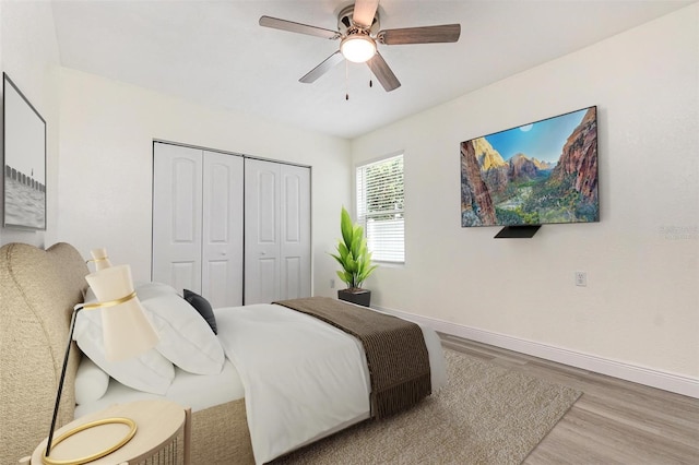 113 Patrick Henry Rd, Bartow, FL 33830 - bedroom featuring wood finished floors, a closet, and a ceiling fan