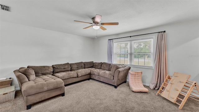 934 Point View Ln, Lakeland, FL 33813 - carpeted living room featuring a ceiling fan and baseboards