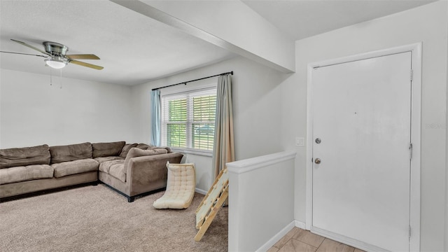 934 Point View Ln, Lakeland, FL 33813 - living area with a ceiling fan, baseboards, and light carpet