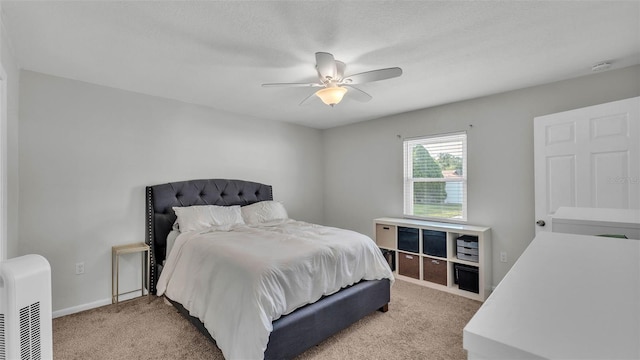 934 Point View Ln, Lakeland, FL 33813 - bedroom with light carpet, ceiling fan, and baseboards